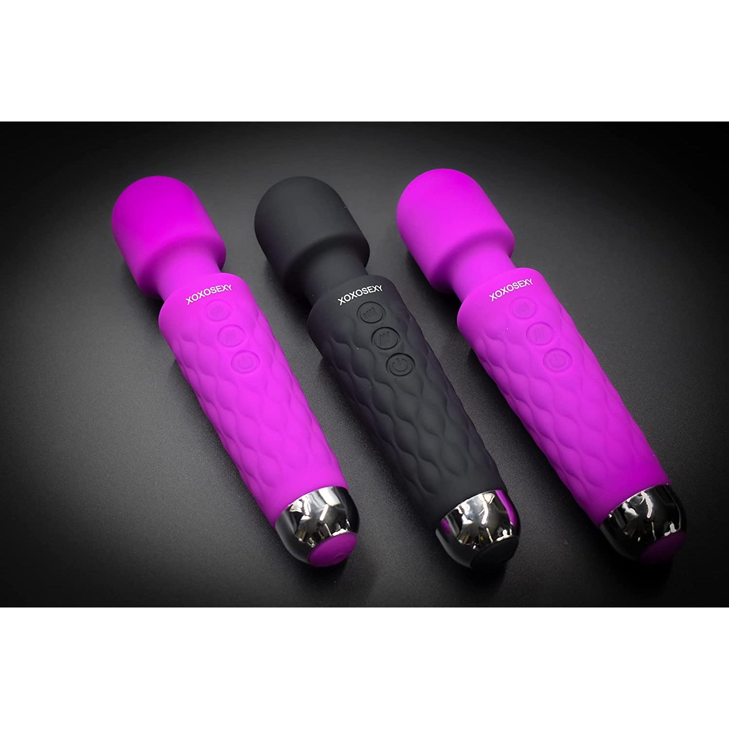 A picture of three Wand massagers on Black back ground