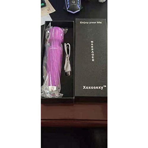 Picture of Purple wand massager in Box with cover off on a desk